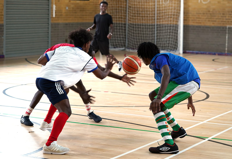 image of young people playing basketball at Big Leaf Foundation sports day 2021 © Big Leaf Foundation