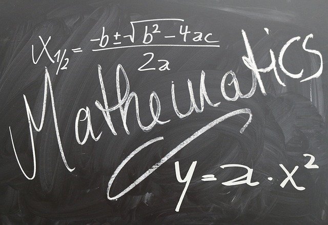 Picture of a black board with chalk writing. Image Pixabay