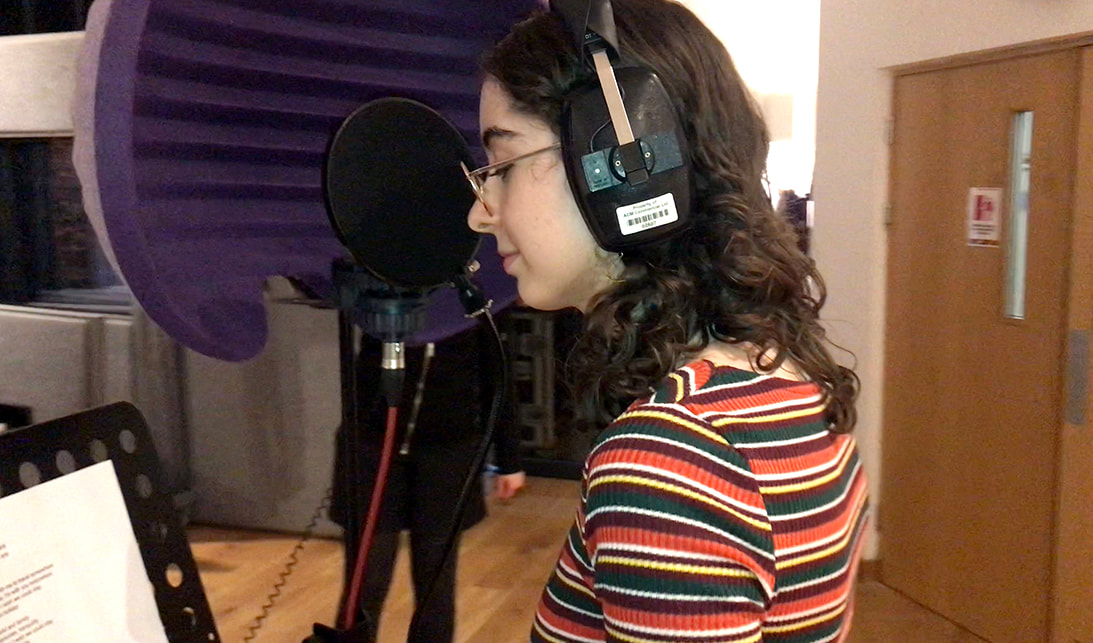 Image of a young person singing in the the ACM recording studio as part of Big Leaf's Music Connects project © Big Leaf Foundation